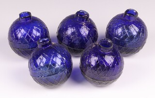 Five Victorian Northern British Glassworks, Perth, moulded glass shooting target balls 'glass pigeons' in cobalt blue, each 7cm diam. 