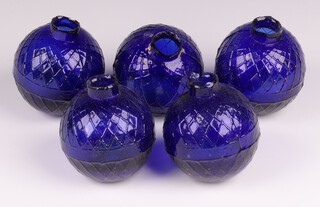 Five Victorian Northern British Glassworks, Perth, moulded glass shooting target balls 'glass pigeons' in cobalt blue, each 7cm diam. 