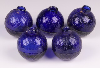 Five Victorian Northern British Glassworks, Perth, moulded glass shooting target balls 'glass pigeons' in cobalt blue, each 7cm diam. 