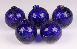 Five Victorian Northern British Glassworks, Perth, moulded glass shooting target balls 'glass pigeons' in cobalt blue, each 7cm diam. 