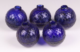 Five Victorian Northern British Glassworks, Perth, moulded glass shooting target balls 'glass pigeons' in cobalt blue, each 7cm diam. 