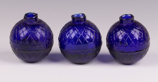 Three Victorian Northern British Glassworks, Perth, moulded glass shooting target balls 'glass pigeons' in cobalt blue, each 7cm diam. 