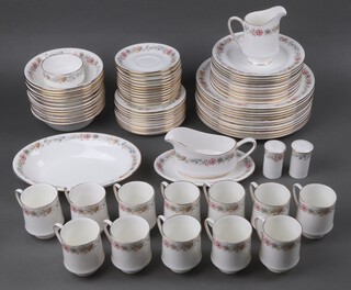 A collection of 79 pieces of Royal Albert and Paragon Belinda pattern dinner service comprising 12 dinner plates (8 by Paragon), 12 side plates (8 Paragon), 12 tea plates (8 Paragon), 12 dessert bowls (8 Paragon), sauce boat and stand (Paragon), oval bowl, salt and pepper, cream jug and sugar bowl, 12 coffee cups and saucers (all Royal Albert) 