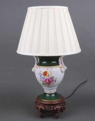 A table lamp formed from a Spode twin handled floral patterned vase on a carved hardwood base 28cm 