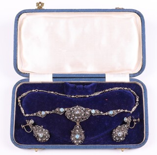 A suite of marcasite set jewellery comprising necklace and 2 earrings set hardstones, cased 