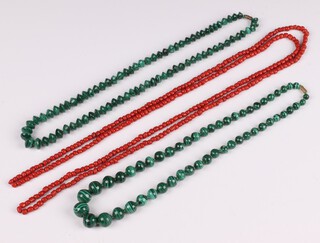 Two strings of malachite beads 53cm and 50cm, together with a string of coral beads 