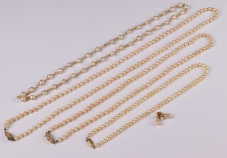Four simulated pearl necklaces