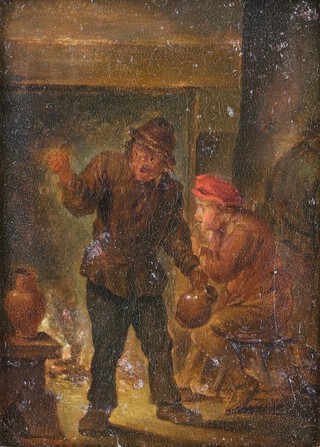 Circle of David Teniers (Dutch, 1610-1690), Two topers smoking in a tavern interior, oil on copper, label verso, 13cm x 9cm, within a gilt frame. Note: an identical composition to the present work was sold at Bonhams, 24th November 2009, lot no. 132.