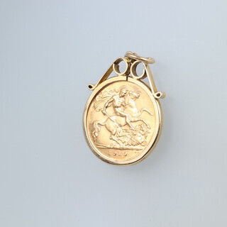 An Edward VII 1910 half sovereign in a 9ct gold pendant mount 5.2 grams