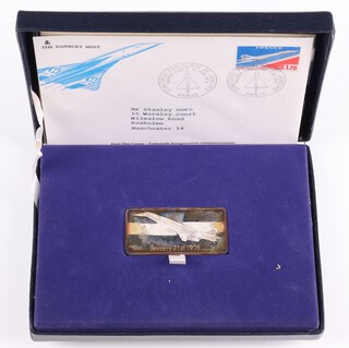 A silver ingot commemorating the launch of Concorde on January 21st 1976, 47.8 grams, the silver ingot depicting a flying Concorde, in a fitted presentation case, with certificate of authenticity and a first day cover addressed to the recipient