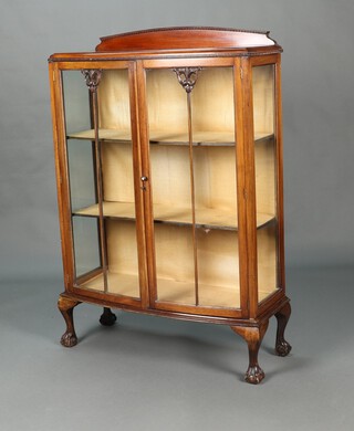 A 1930's bow front mahogany display cabinet with raised back 134cm h x 88cm w x 38cm d 