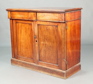 A Victorian mahogany chiffonier fitted 2 secret drawers above a cupboard fitted 2 trays and a cellarette drawer enclosed by a pair of panelled doors, raised on a platform base 92cm h x 107cm w x 47cm d 