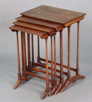 An Edwardian nest of 4 rectangular mahogany coffee tables, raised on turned supports 69cm h x 53cm w x 36cm d