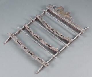 A Victorian carved and pierced oak 3 tier plate rack, the top carved a figure of a seahorse 115cm h x 83cm w x 9cm d 