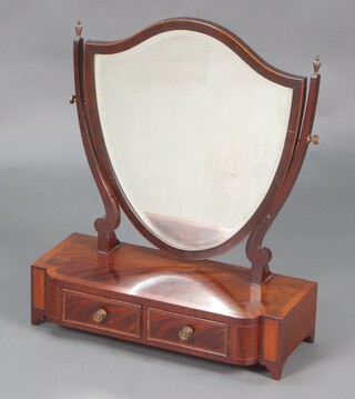 A 19th Century shield shaped dressing table mirror contained in a mahogany frame, on a shaped crossbanded mahogany base fitted 2 drawers 62cm h x 52cm w x 23cm d 