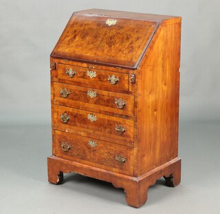 A Queen Anne style walnut bureau, the fall front with fitted interior above 4 drawers, raised on bracket feet 99m h x 61cm w x 42cm d 