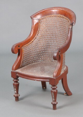 A child's 19th Century mahogany tub back training chair with woven cane seat and back, raised on turned supports 61cm h x 36cm w x 33cm d  