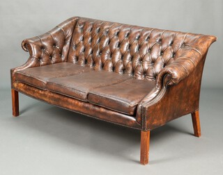 A Victorian style 3 seat Chesterfield sofa upholstered in brown buttoned leather, raised on square supports 81cm h x 159cm w x 69cm (inside 128cm x 50cm) 