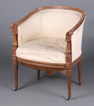 A 1920's Empire style show frame tub back chair, the seat and back upholstered in white material, raised on turned supports 77cm h x 65cm w x 48cm d 