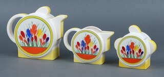 A Moorland Chelsea Works Burslem Art Deco and Clarice Cliff style crocus pattern 3 piece tea service with tea pot, milk jug and sugar bowl 
