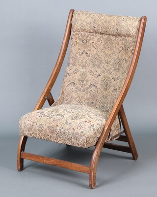 A 1920's beech framed folding campaign style chair 81h x 50w x 45d 