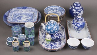A Chinese blue and white ginger jar and cover decorated prunus and a collection of Chinese blue and white tableware