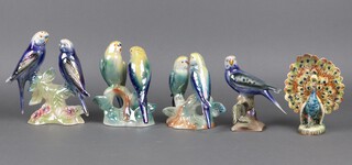 Two Campsie Ware figures of 2 budgerigars 15cm, 2 Dutch figures of budgerigars and a figure of a peacock 