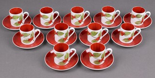 A 22 piece Continental porcelain coffee set decorated berries 