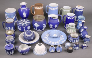 A collection of Wedgwood blue and white and other Jasperware to include milk jugs, vases, plates etc 