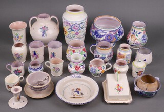 A collection of Poole Pottery including butter dish and cover, milk jugs, vases etc 