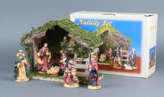 A 6 piece resin Nativity set, boxed 