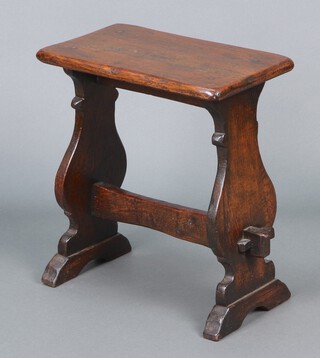 A rectangular oak stool, raised on panelled supports with H framed stretcher 44h x 39w x 24d 