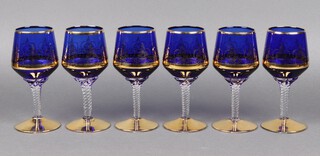 A set of 6 Murano blue glass and gilt decorated wine glasses