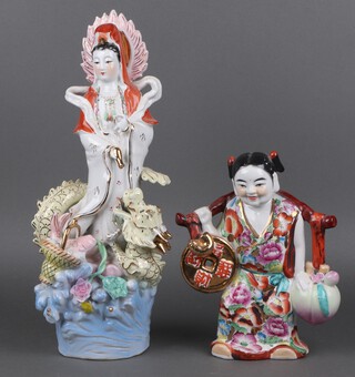 A Chinese porcelain figure of Quan Yin 42cm and 1 other of a standing lady 25cm 