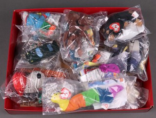 A collection of various McDonalds Happy Meal toys