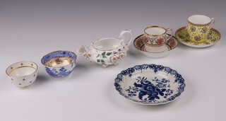 A Dr Wall Worcester blue and white plate with floral decoration 17cm (cracked and glued), a Bodley porcelain cup and saucer, a Continental cup and saucer (star crack to base), a Derby style cream jug and 2 19th Century tea bowls 