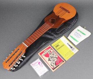 A 10 stringed Charango lute with instructions 
