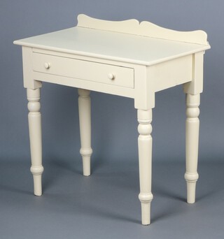 A Victorian white painted pine side table with raised back, fitted a frieze drawer, raised on turned supports 97h x 78w x 44d  