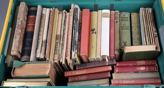 One edition of The Strand Magazine 1895, half leather bound and a collection of other books contained in a green plastic box 