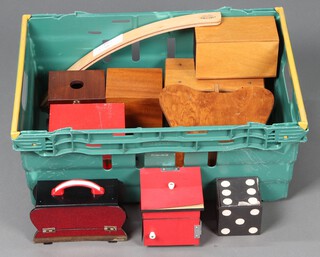 A collection of Magic Prop boxes, all contained in a green plastic box 