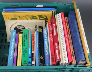 A collection of 1970's and 80's Tommy Cooper and other magic books, all contained in a green plastic crate