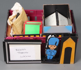 A collection of various Supreme Magic Trick boxes etc, contained in a purple box 