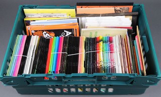 A collection of various Magic Magigram and other magazines, all contained in a green plastic box 
