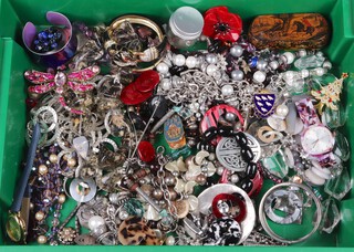 A quantity of costume jewellery including brooches, chains, beads etc