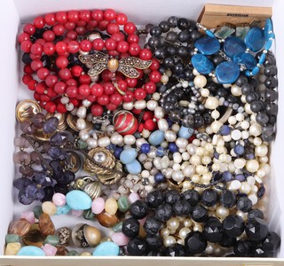 A collection of costume jewellery including ear clips and bead necklaces 