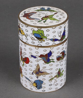 A cylindrical Japanese enamelled cloisonne jar and cover decorated butterflies 11cm 