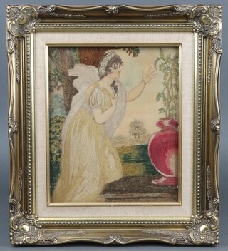 An 18th/19th century stump work picture of a standing girl with an urn 28h x 24w, within a decorative gilt frame 