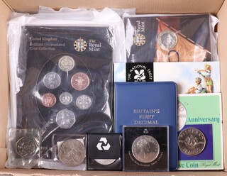 A collection of various commemorative crowns, 3 2008 two pound coins and 2 proof sets of 2008 coins  