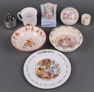A Royal Doulton Winnie The Pooh plate, a ditto mug, a Bunnykins New Arrival bowl and a moneybox, a Masons teddybear dish and other items