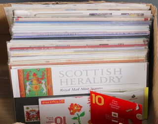 A collection of GB Elizabeth II presentation stamps and a small collection of first day covers 